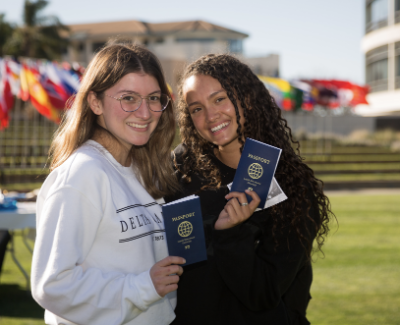 Students holding passports at Global Citizen Event